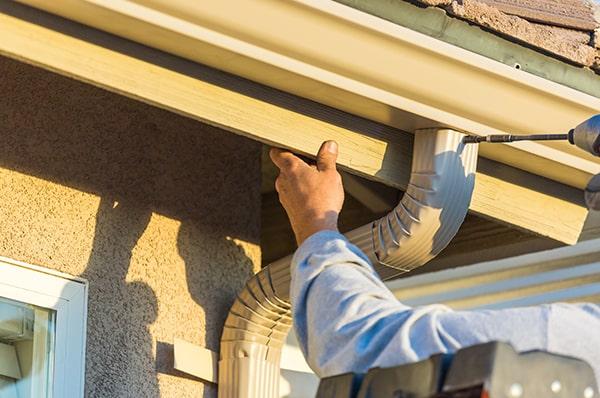 we recommend clearing any debris from the roof and trimming nearby trees before gutter installation